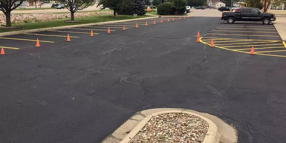 The Top Benefits of Asphalt Sealcoating Companies for Your Property